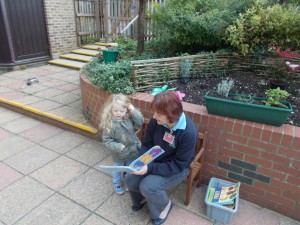 A teacher reading to a child